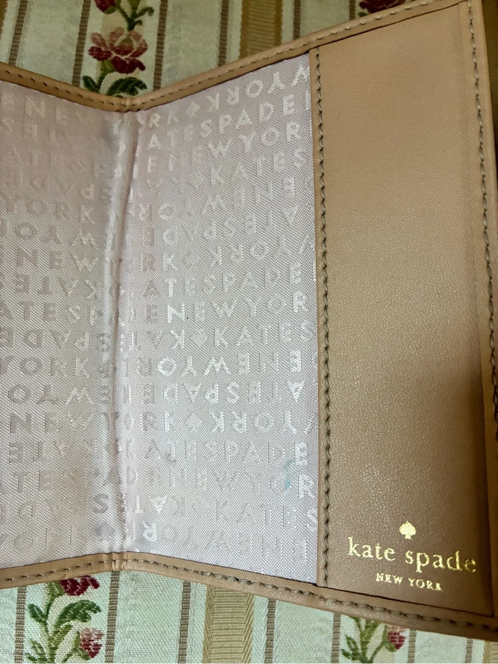 kate spade Metallic Rose Gold Pebbled Passport Cover